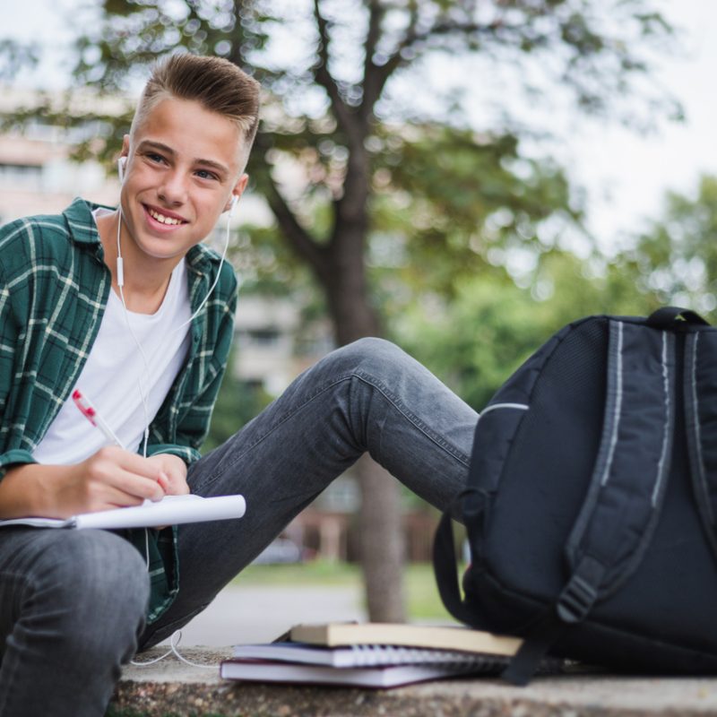 teenage boy using mental health checklist for students