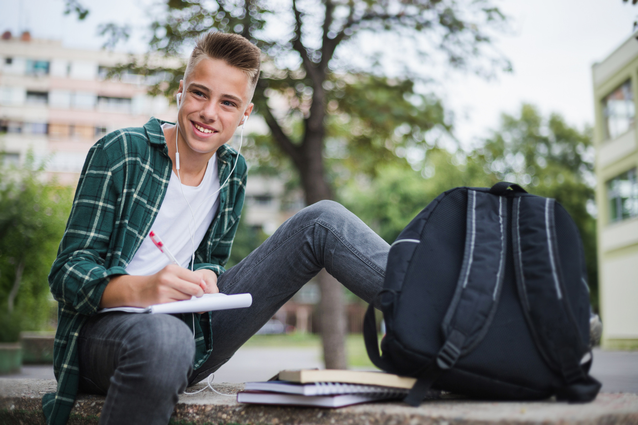 teenage boy using mental health checklist for students
