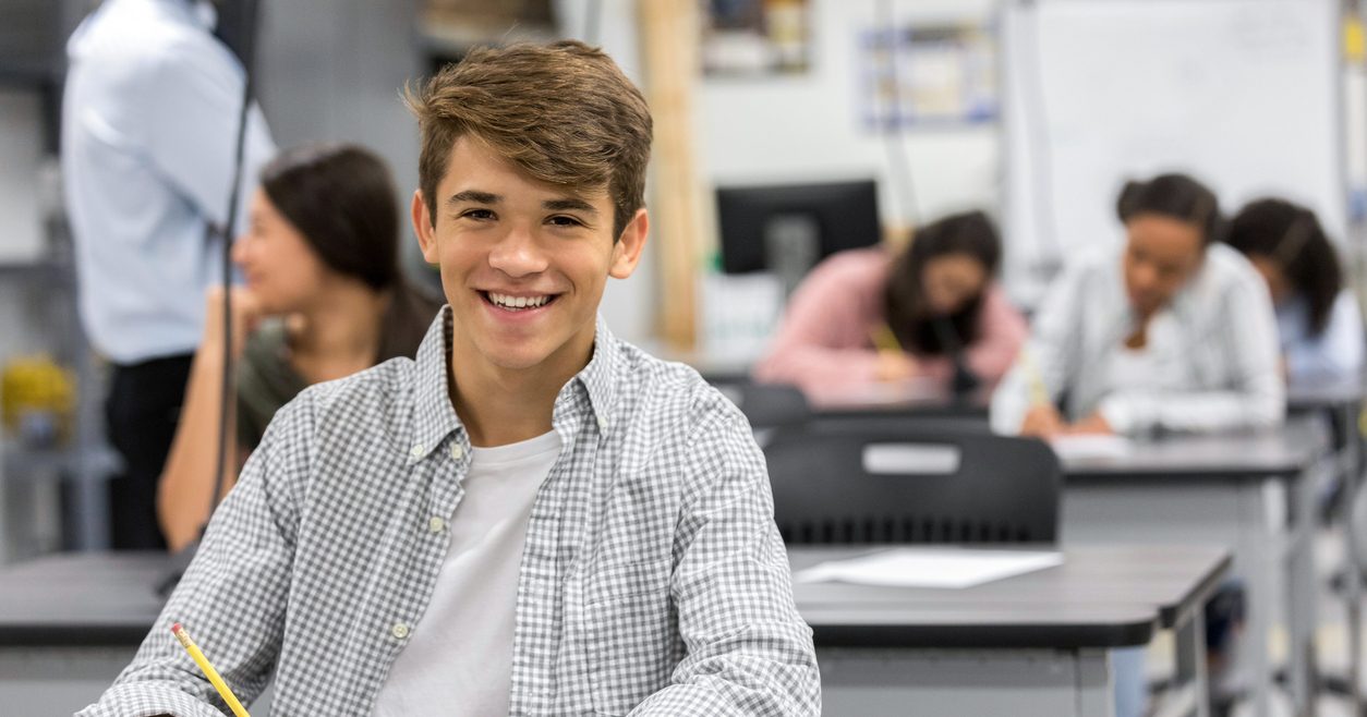 smiling teen boy enjoying the benefits of residential treatment